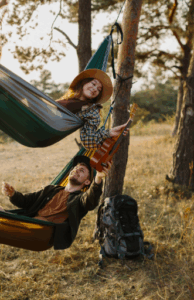 Friends sharing peaceful hammock time in nature while embracing Good Friday Wellness Psilocybin Magic Mushrooms