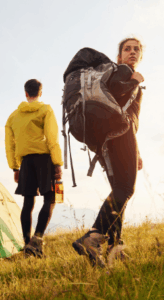 Two hikers in the golden hour carrying backpacks – Good Friday Wellness magic mushrooms