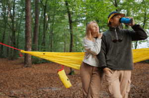 Couple relaxing in forest with Good Friday Wellness magic mushrooms